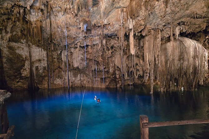Chichen Itza and 3 cenotes tour with transportation from Valladolid - Cenote Ik kil: swimming time with a strong safety reminder