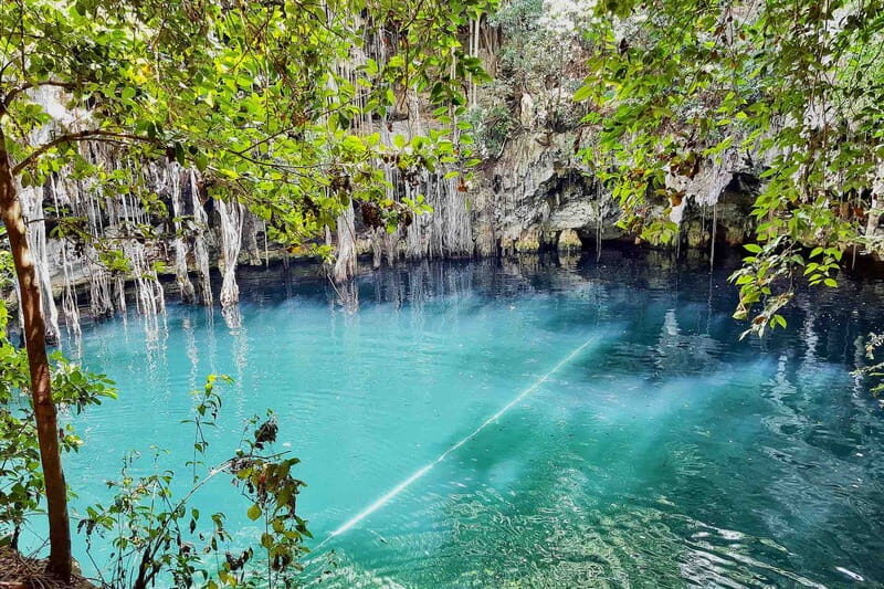 From Tulum: Chichén Itzá Tour, Cenote & Valladolid - Yokdzonot cenote: cool water plus real Yucatán snacks